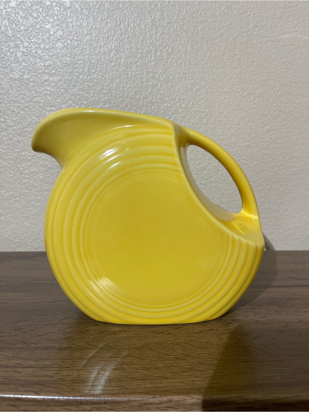 Fiesta Yellow Circular Ceramic Pitcher with Integrated Handle